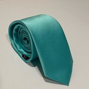 Aqua colored tie. Sateen material.